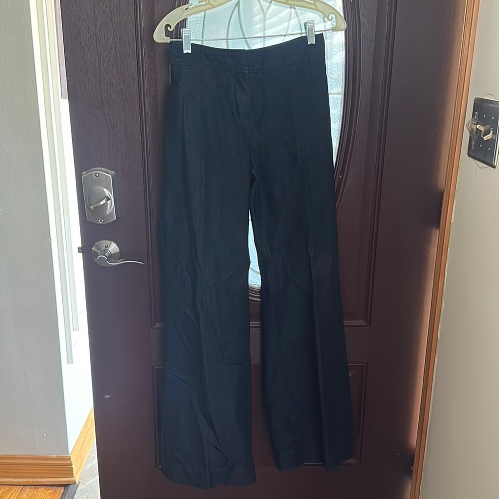 Slightly worn very nice wide legged, Kenneth Cole, denim pants